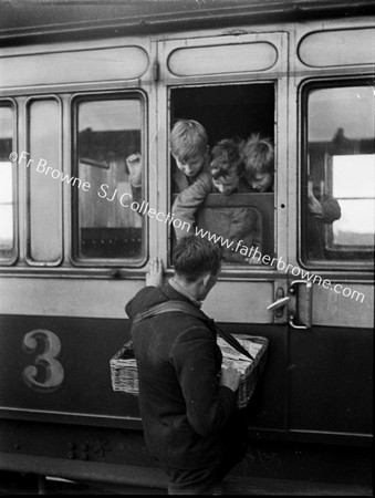 BOYS AT 3RD CLASS WINDOWS